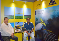 Juan Phillips and Francisco Hurtado crop spraying.